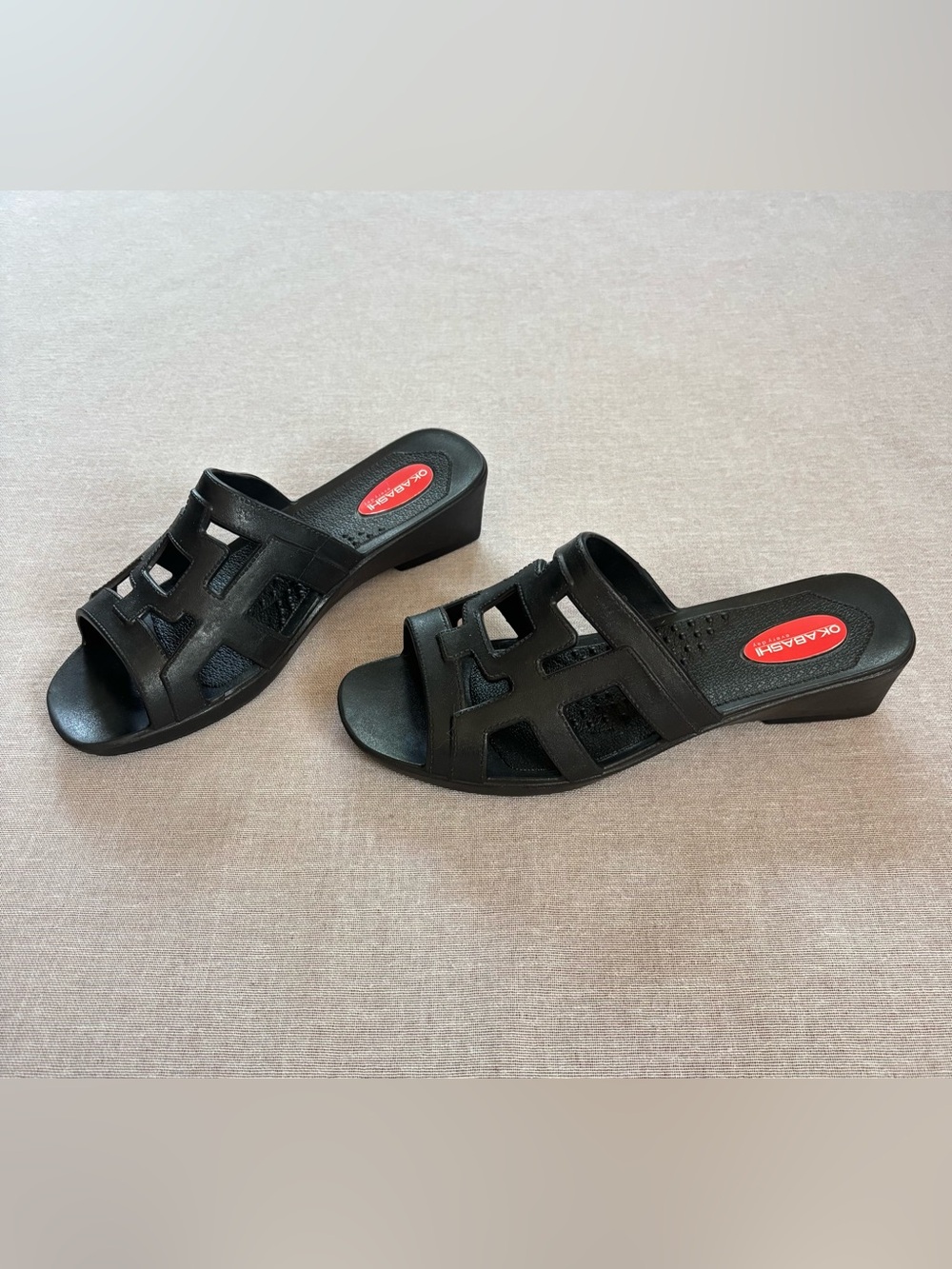 Okabashi black rubber geometric cutout mules sandals